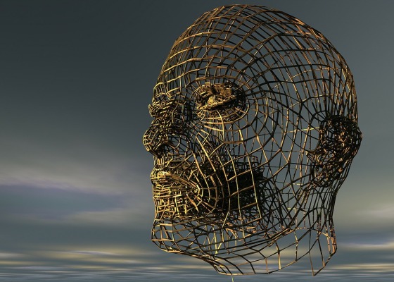 A sculpture of a human head made with wire mesh