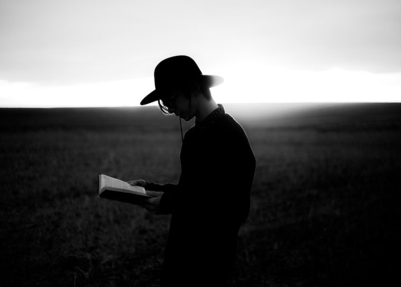 Man reading Scripture
